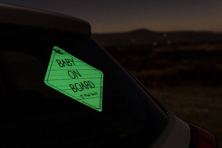 Malibabi sign glowing at night